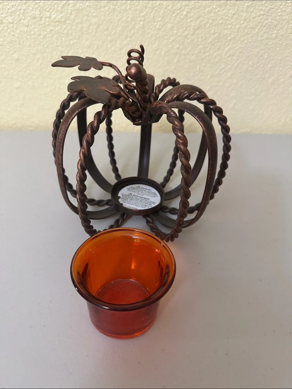 Pier 1 Bronze-Tone Twisted Metal Pumpkin Candle Holder with Amber Glass